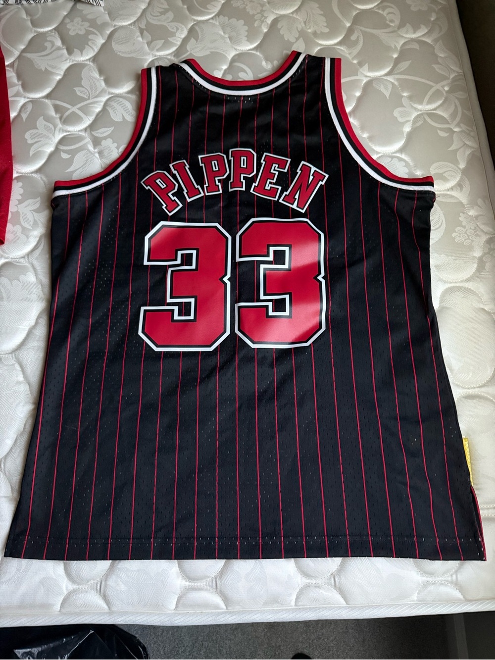 Mitchell & Ness Black Basketball Jersey with Red Trim - Pippen 33